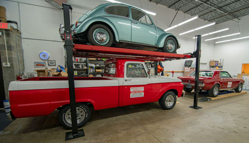 Owner's vintage autos housed at the National Fuse Products warehouse.